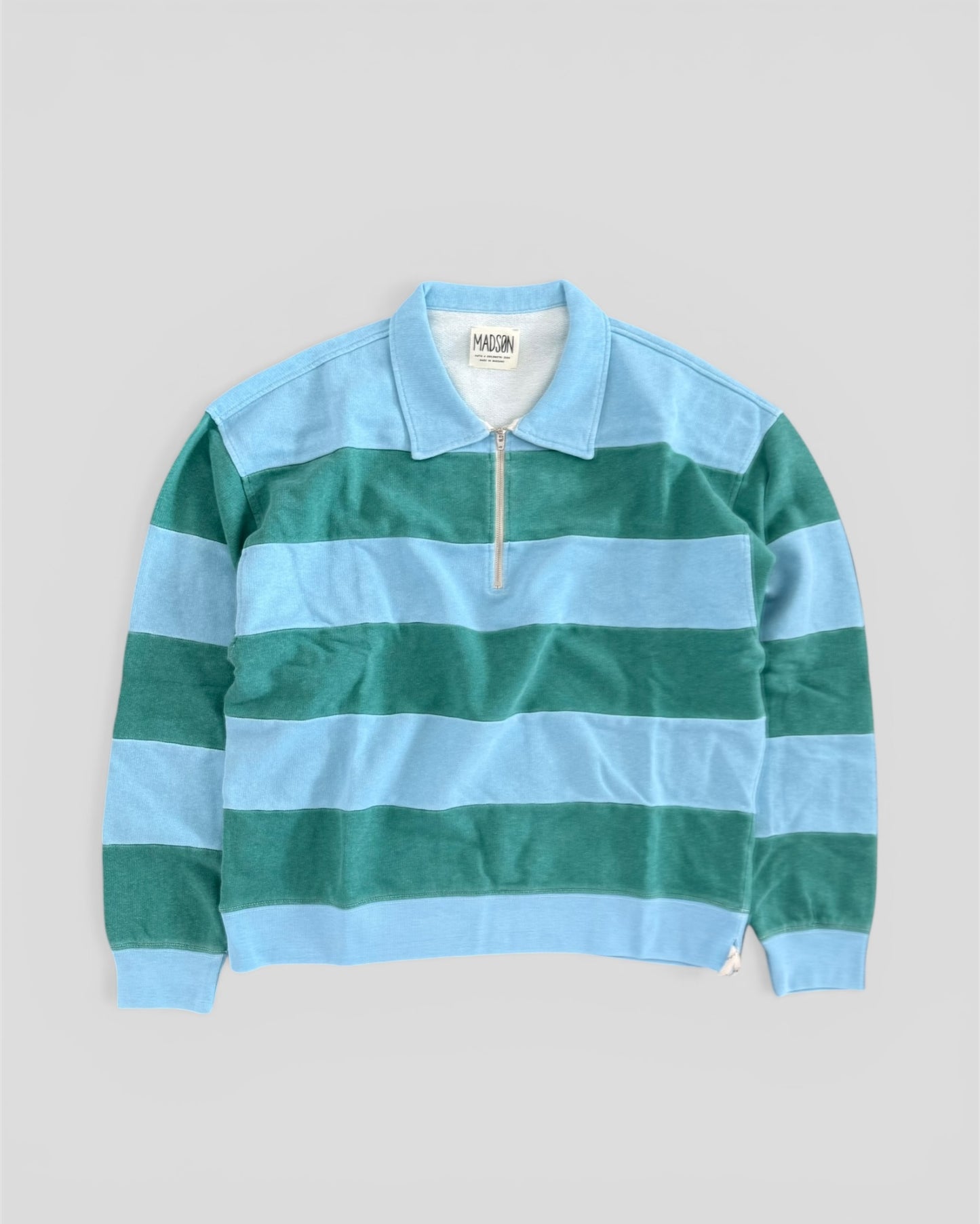 Polo zip riga placcata